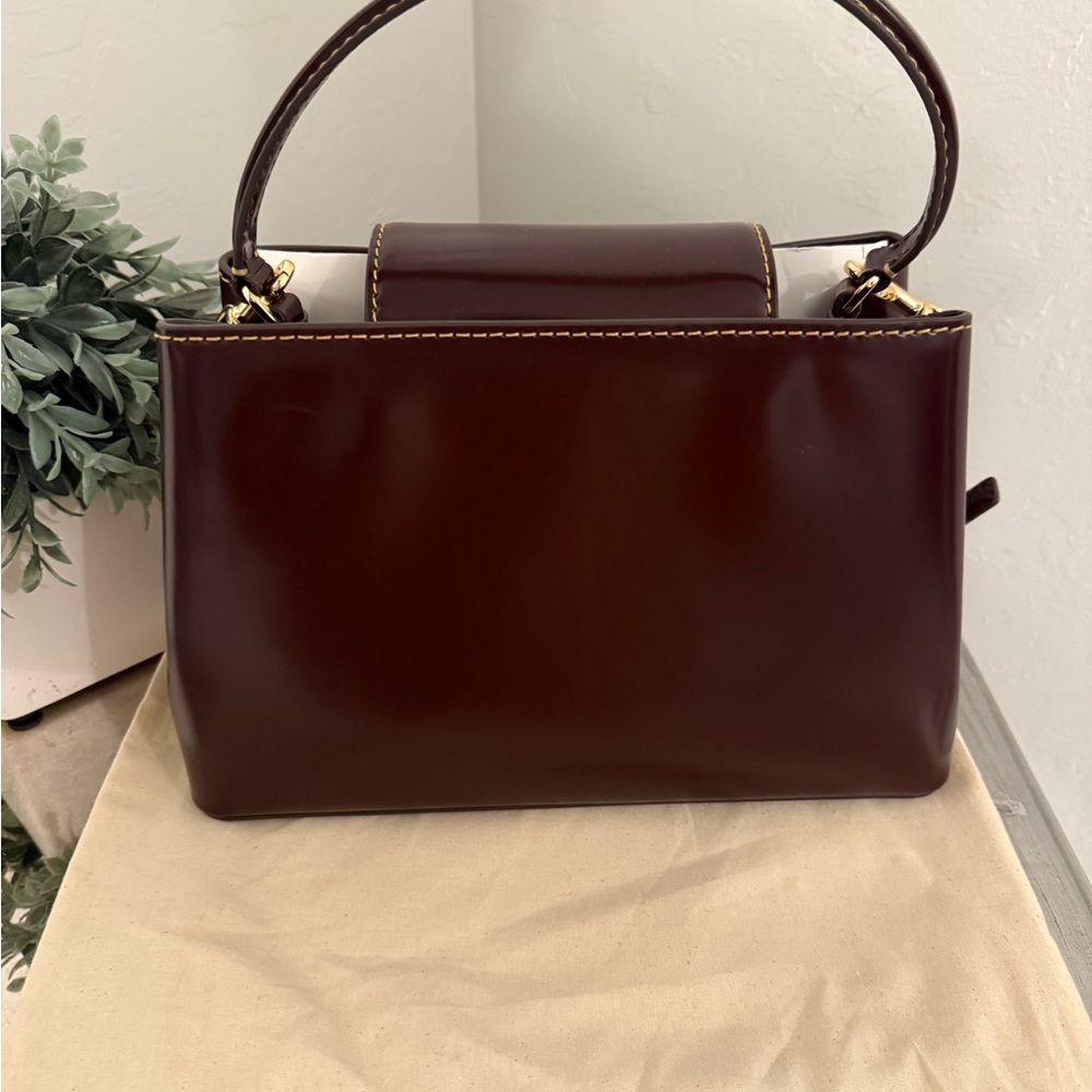 Tory Burch Britten Top Handle Patent Leather
Claret Red - Picture 3 of 8